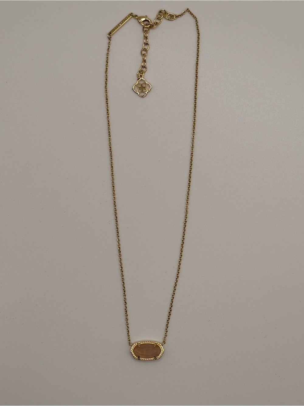 Kendra Scott Gold Necklace with Pink Oval Pendant